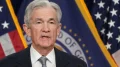 Fed holds rates steady, indicates three cuts coming in 2024