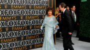 Joan Collins, 90, sparkles on the Emmys 2024 red carpet in blue sequined gown